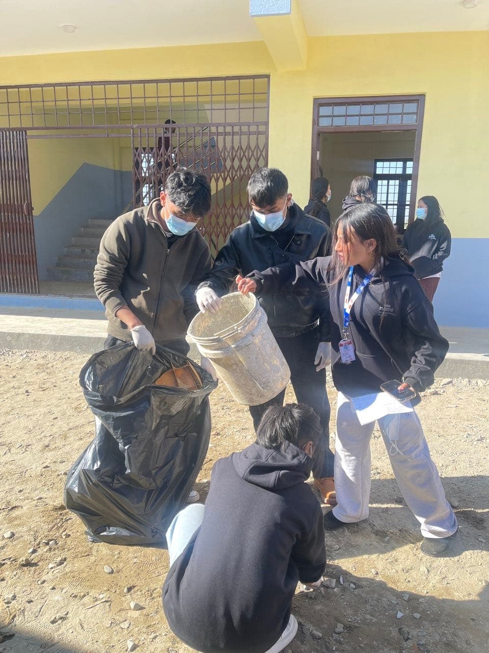 Distributing warm clothing to families
