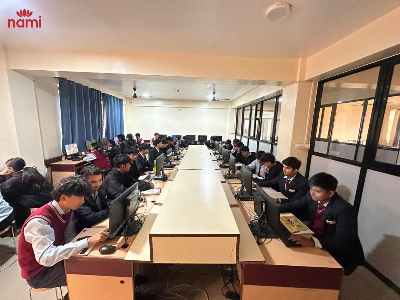Modern computer laboratories equipped with high-speed workstations for interactive learning.